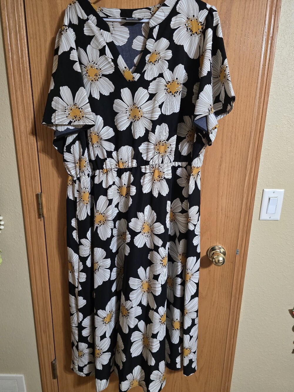 Women's Black Floral Daisy Dress with Yellow Centers